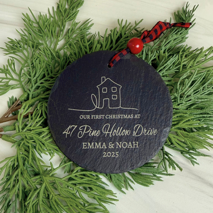 Laser engraved details of couple’s names, street name, and year on Our First Christmas At 4-inch slate ornament, personalized keepsake for newlyweds or new homeowners.